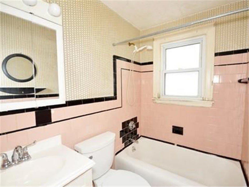 renovation before photo outdated pink bathroom